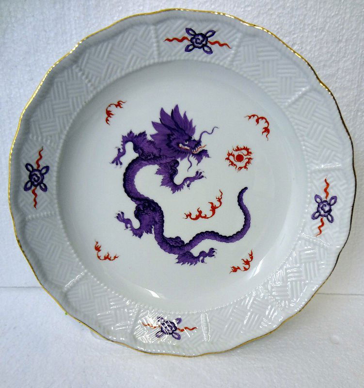 Meissen Porcelain Charger: Meissen Porcelain Charger with painted purple dragon kakiemon style. Measures - 2" high x 14" diameter.For Domestic or International Shipping Quotes Please Feel Call Ryan or Dave at Eagle Shipping Cen