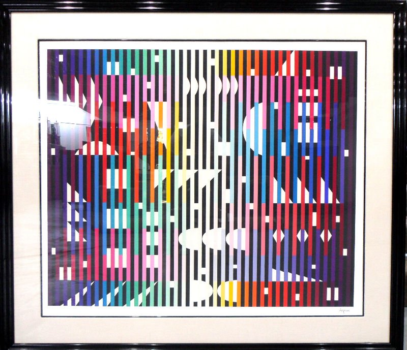Yaacov Agam Lithograph "Magic Rain": Yaacov Agam lithograph entitled "Magic Rain. The work is stunning, with bright colors peeking out from behind stark black lines. Pencil signed and numbered 66/180. Measures 37 1/2" X 43 1/2", frame 5 