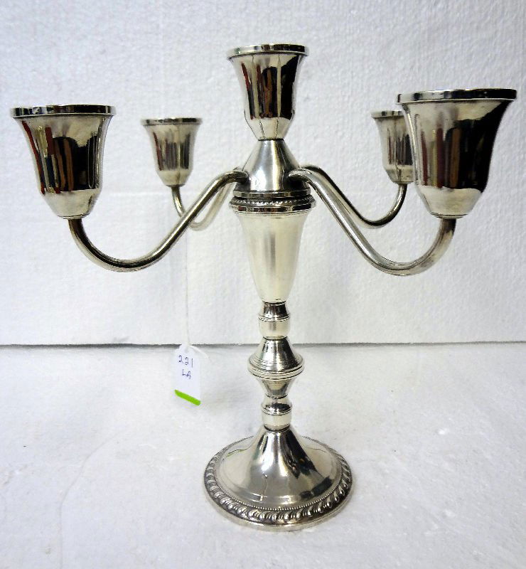 5 Light Sterling Silver Candelabra: 5 Light Sterling Silver Candelabra, weighted. Measures - 19 1/2" high x 10" wide.For Domestic or International Shipping Quotes Please Feel Call Ryan or Dave at Eagle Shipping Center 561-932-0700 or em