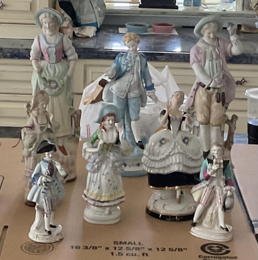 Lot of Eight Hand Painted Porcelain Figural Statues (1 of 1)