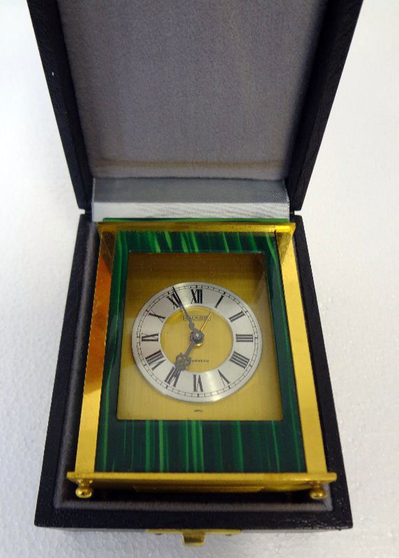 Luxor Tourneau Malachite & Bronze Desk Clock: Luxor Tourneau Malachite & Bronze Desk Clock with original box. Made in Sweden. Measures - 4" high x 3" wide.For Domestic or International Shipping Quotes Please Feel Call Ryan or Dave at Eagle Shippi