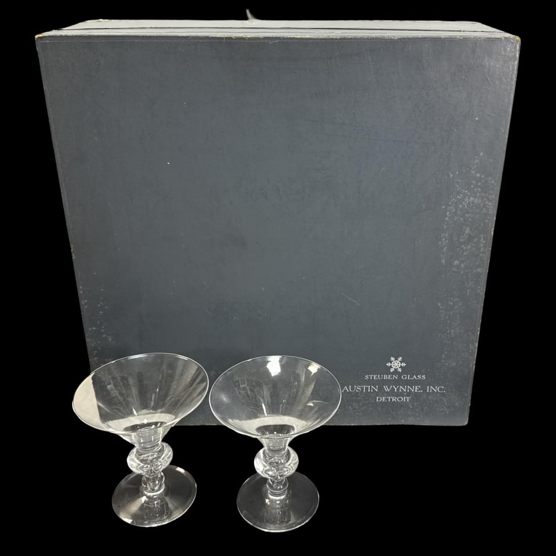 Lot of Eight Steuben Crystal Teardrop Champagne Glasses: Lot of Eight Steuben Crystal Teardrop Champagne Glasses measures H: 4 3/4" x DIA: 4 1/2". Includes original dust covers and box