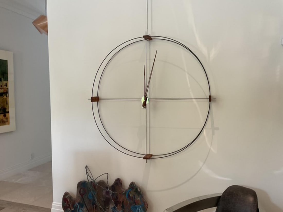 Abstract Atelier Hanging Wall Clock: Abstract Atelier Hanging Wall Clock DIA: 54". Original retail price of $1,600.00