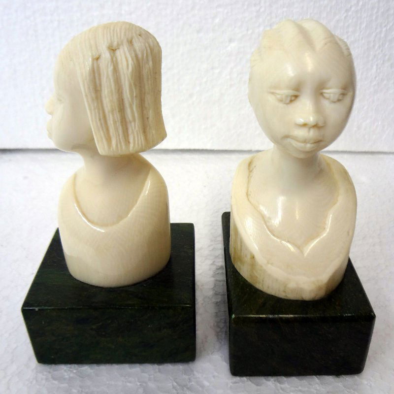Pair of African Ivory Bust: Pair of African Ivory Bust on marble base. Measures 4" high x 3" wide.For Domestic or International Shipping Quotes Please Feel Call Ryan or Dave at Eagle Shipping Center 561-932-0700 or email them at