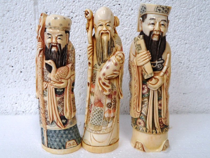 3 Chinese Carved Ivory Figures of Elders: 3 Chinese Carved Ivory Figures of Elders. One is holding a baby, the other duck, and other with pipe. Measures varie - 8" - 8 1/2"For Domestic or International Shipping Quotes Please Feel Call Ryan or