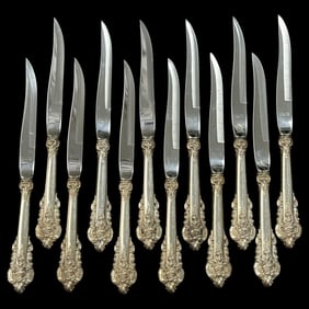 Lot of Twelve Wallace Grande Baroque Sterling Silver Steak Knives Featuring a Stainless Steel Bevel