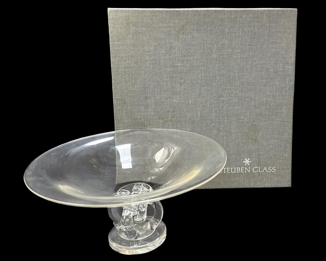 Signed Steuben Four Legged Crystal Bowl: Signed Steuben Four Legged Crystal Bowl. Signed & dated 1982 on bottom, measures H: 5" x DIA: 10 1/8". Includes original box, pouches, & paperwork