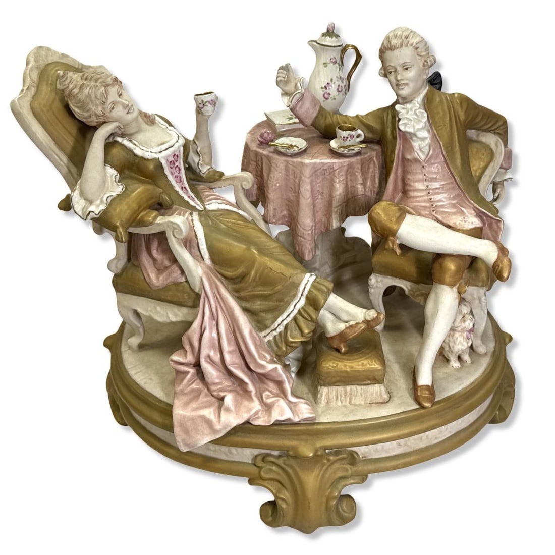 Royal Dux Porcelain Figural Group of a Couple Having Tea: Royal Dux Porcelain Figural Group of a Couple Having Tea measures H: 12 7/8" x W: 15" x L: 12"