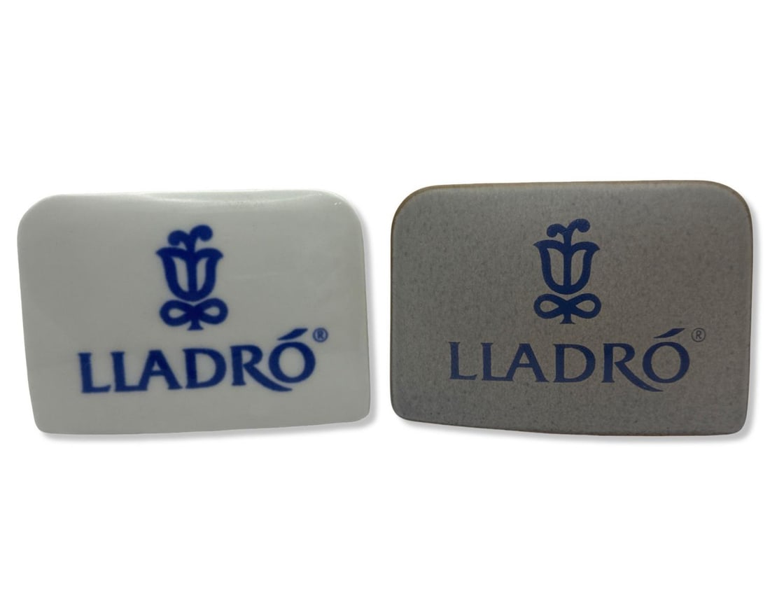 Pair of Lladro Porcelain Display Plaques: Pair of Lladro Porcelain Display Plaques measures H: 2 1/2" x W: 3 5/8"