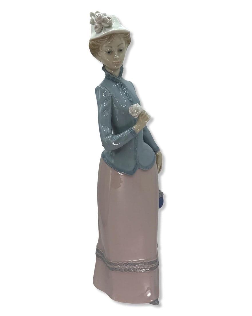 Lladro Victorian Era Woman Holding a Rose Porcelain Figurine (1 of 2)