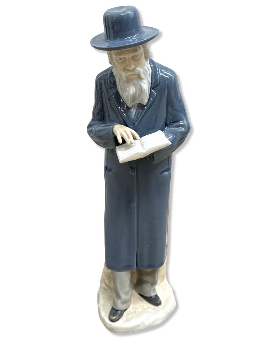 Lladro Nao Rabbi Porcelain Figurine: Lladro Nao Rabbi Porcelain Figurine measures H: 11 3/4" x W: 3 3/4"