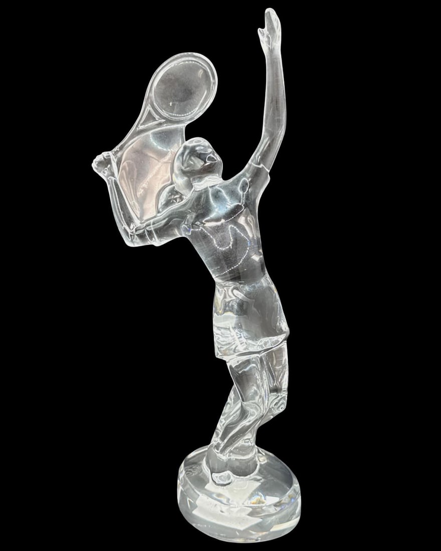 Baccarat Clear Crystal Tennis Player Sculpture: Baccarat Clear Crystal Tennis Player Sculpture. Marked on bottom, measures H: 12" x W: 5"
