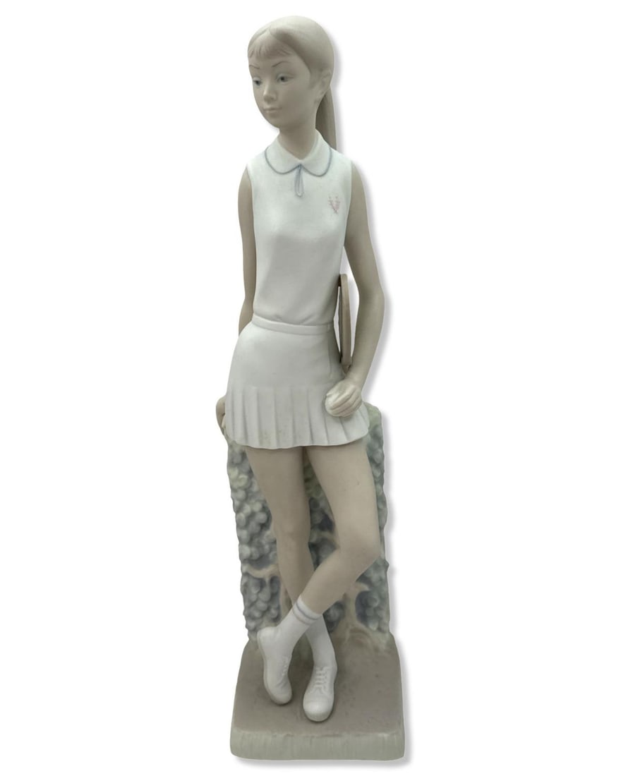 Lladro 4798 Tennis Player Porcelain Figurine Featuring a Matte Finish: Lladro 4798 Tennis Player Porcelain Figurine Featuring a Matte Finish measures H: 12 3/4" x W: 3 1/4"