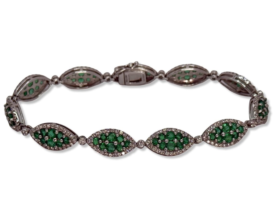 14kt WG, Diamond, & Emerald Bracelet: 14kt WG, Diamond, & Emerald Bracelet measures DIA: 3 1/4", weighs 9.70dwt