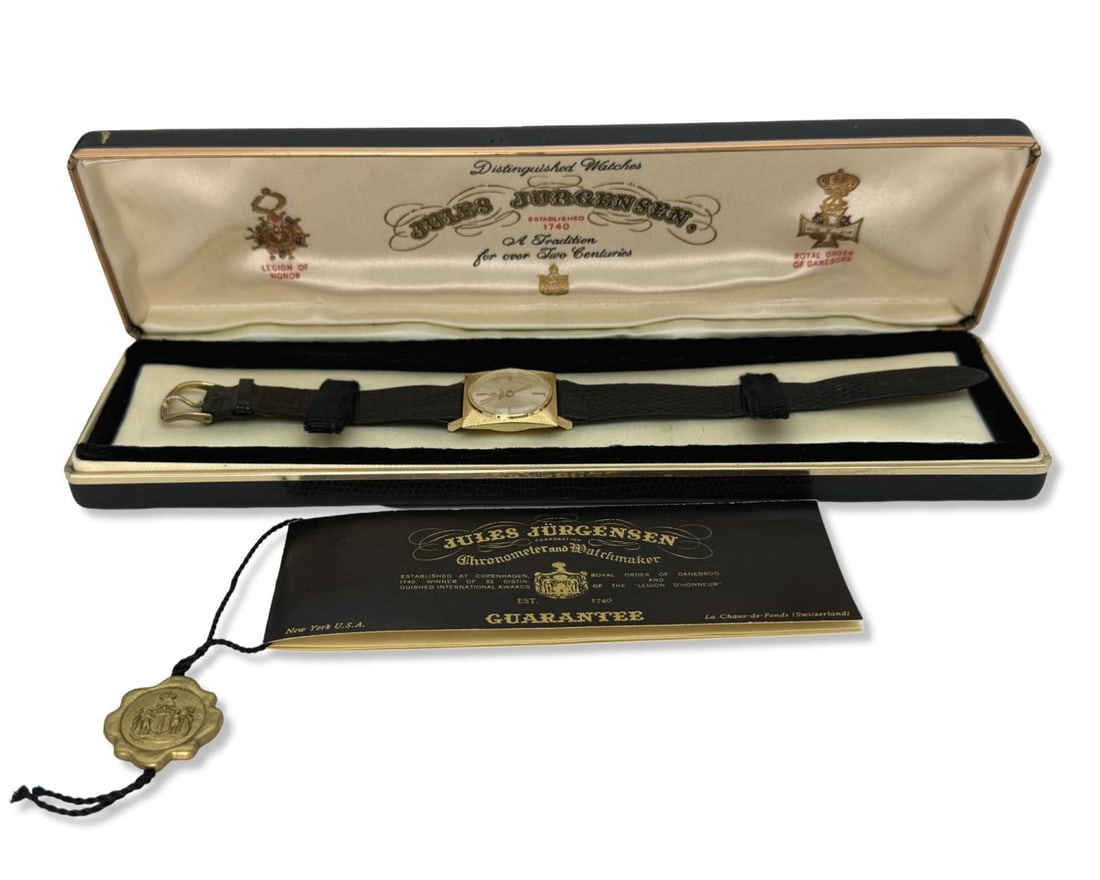 Rare Jules Jurgensen 14kt YG Men's Dress Watch Featuring a Champagne Gold Tone Dial and Black: Rare Jules Jurgensen 14kt YG Men's Dress Watch Featuring a Champagne Gold Tone Dial and Black Leather Band measures L: 8 7/8" x W: 1". Includes original box and guarantee manual