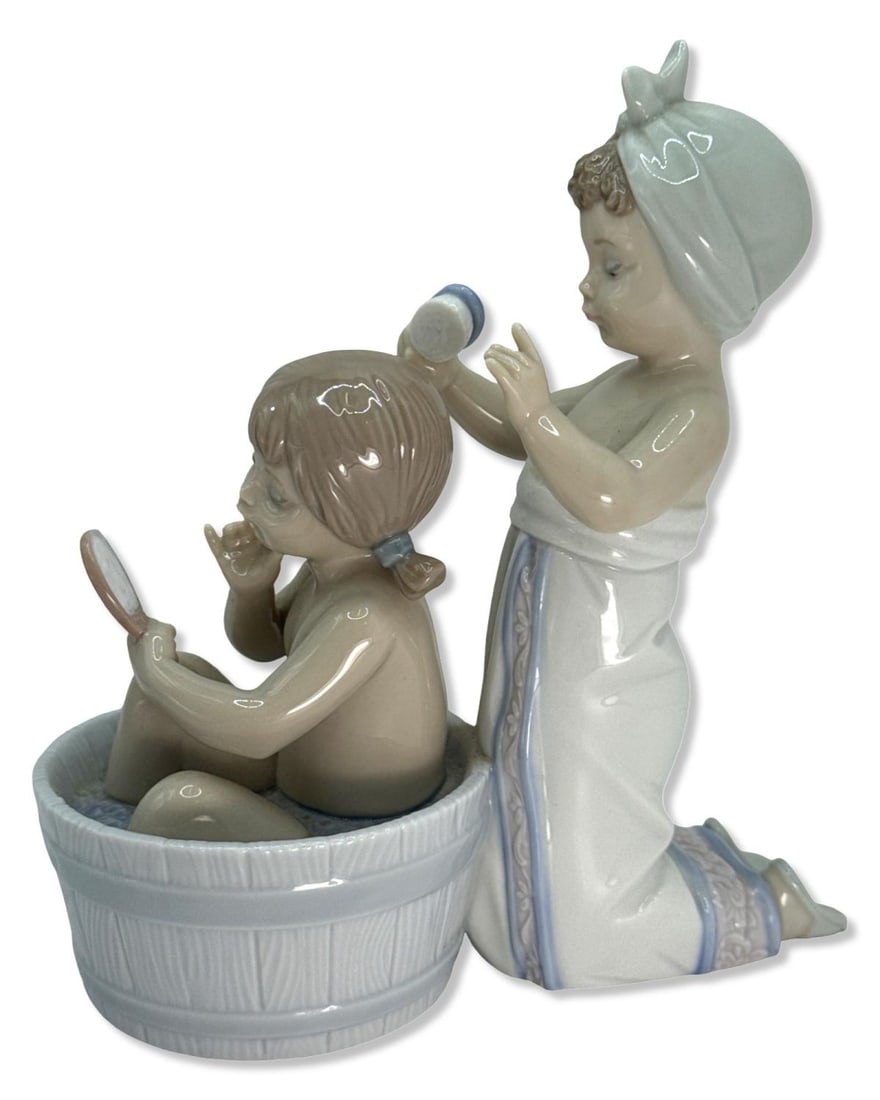 Lladro 6457 Bathing Beauties Porcelain Figurines: Lladro 6457 Bathing Beauties Porcelain Figurines measures H: 6 3/4" x W: 6"