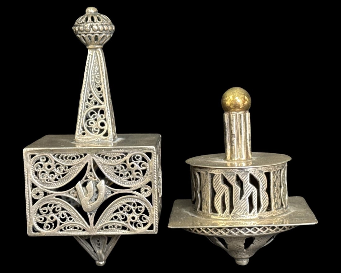 Pair of Sterling Silver Judaica Dreidels. Largest measures H: 3 1/2" x W: 1 5/8" (1 of 2)