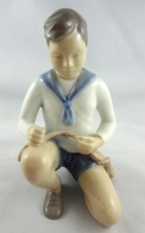 B&G Porcelain Figure of Boy: B&G Porcelain Figure of Boy. Measures - 5 1/4" high.