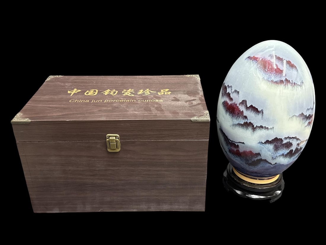 Chines Jun Ware Porcelain Egg Sculpture with Rotating Wood Base & Original Box: Chines Jun Ware Porcelain Egg Sculpture with Rotating Wood Base & Original Box H: 14"