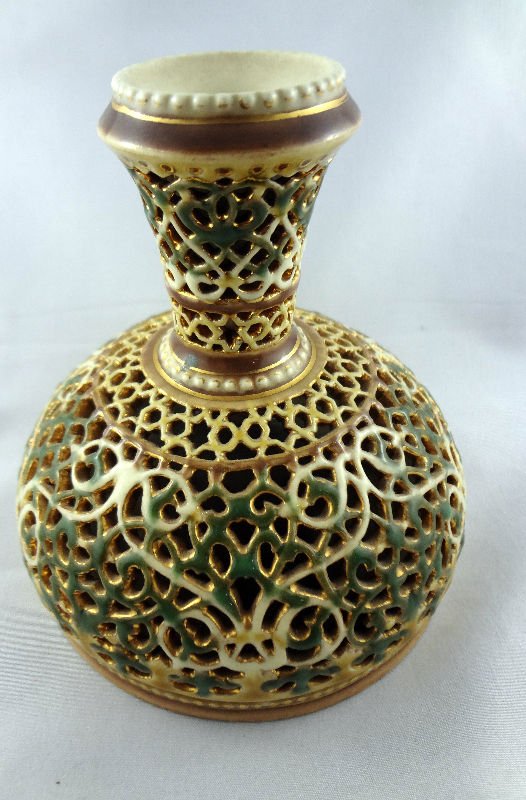 Zsolnay Hungary Reticulated Bud Vase: Zsolnay Hungary Reticulated Bud Vase. Signed #2673. Measures - 5" high x 4 1/4" wide.