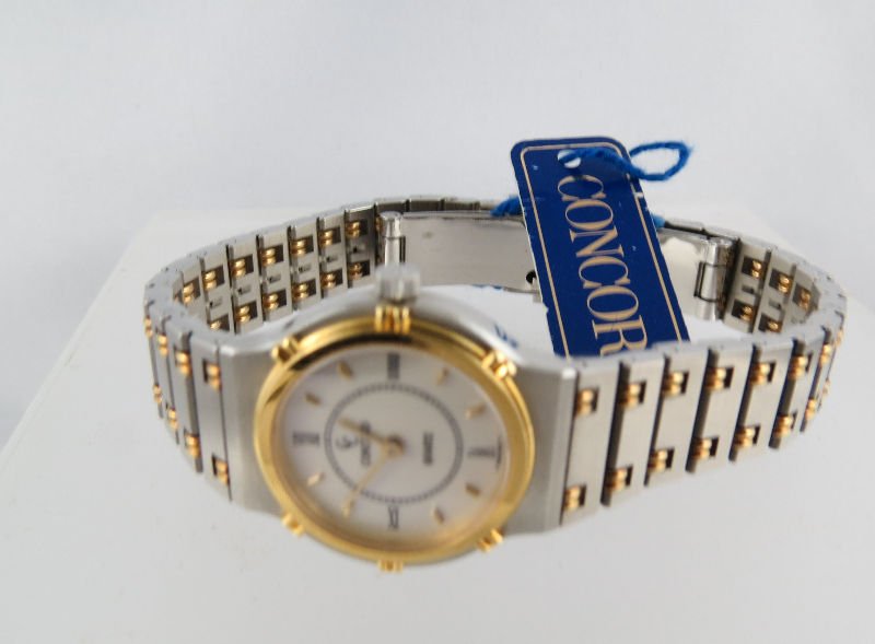 Concord 18Kt YG Stainless Woman's Luxury Watch: Concord 18Kt YG Stainless Woman's Luxury Watch with beautiful two-tone sporty design.