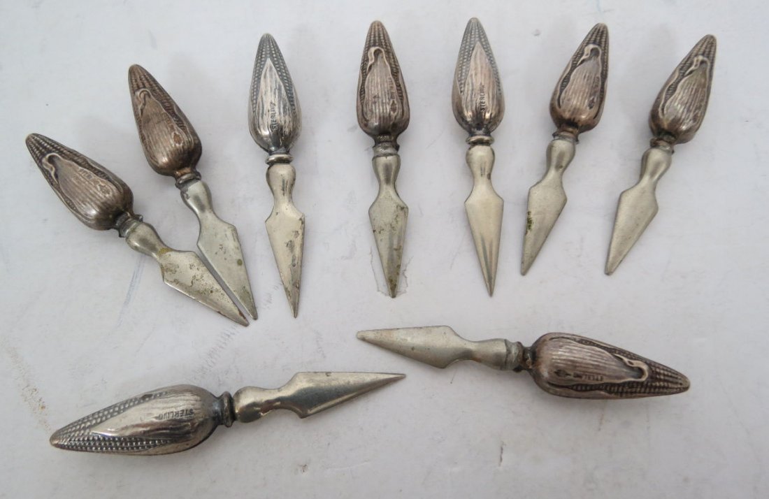 9 Pc. Sterling Corn Holders: 9 Pc. Sterling Corn Holders.