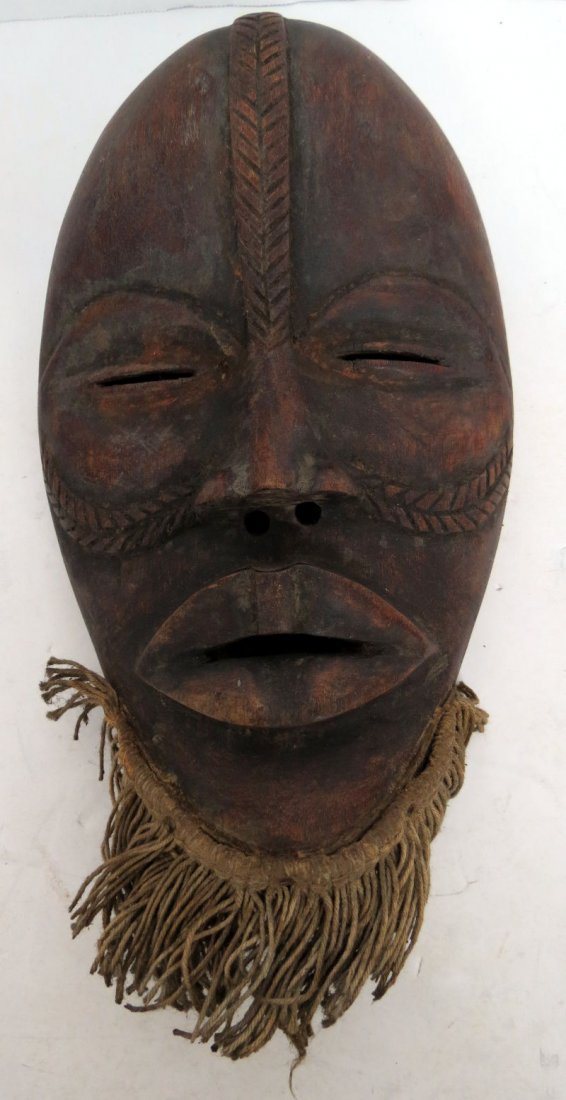 African Tribal Hand Carved Mask: African Tribal Hand Carved Mask. Measures - 9 7/8" high x 5 7/8" wide.
