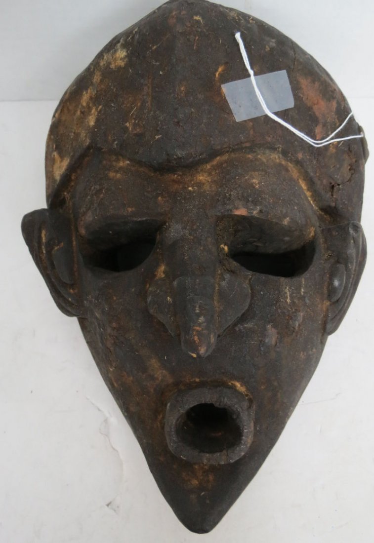 African Tribal Hand Carved Mask: African Tribal Hand Carved Mask. Measures - 12 1/2" high x 11 1/2" wide.