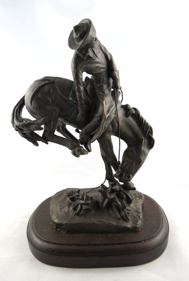 Frederic Remington "Outlaw" Miniature Bronze Figure: Frederic Remington "Outlaw" Miniature Bronze Figure. Measures - 8" high x 5 3/4" wide.