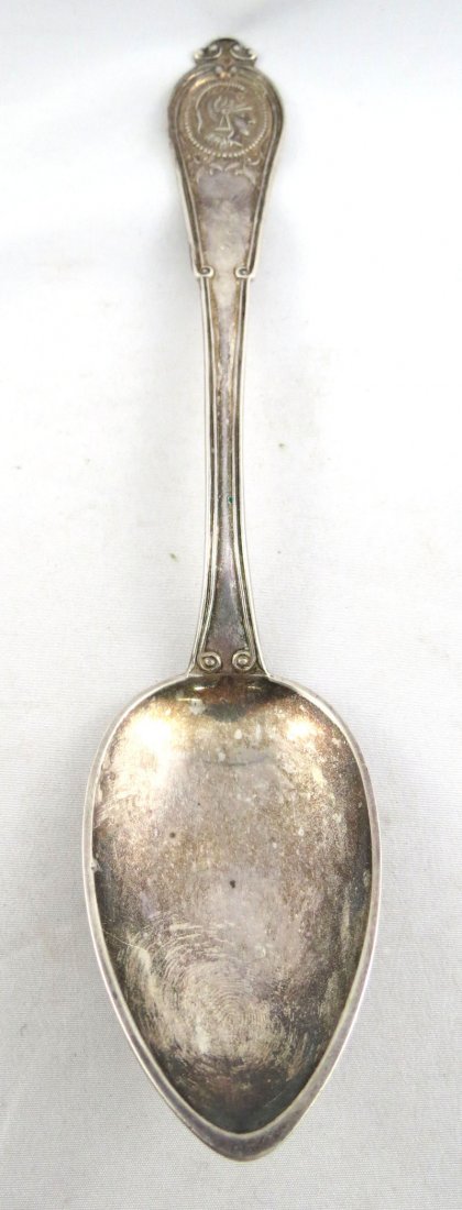 Coin Silver Duhme & Co. Medallion Table Spoon: Coin Silver Duhme & Co. Medallion Table Spoon. Measures - 8 1/2" long. Weighs - 2 ozt.