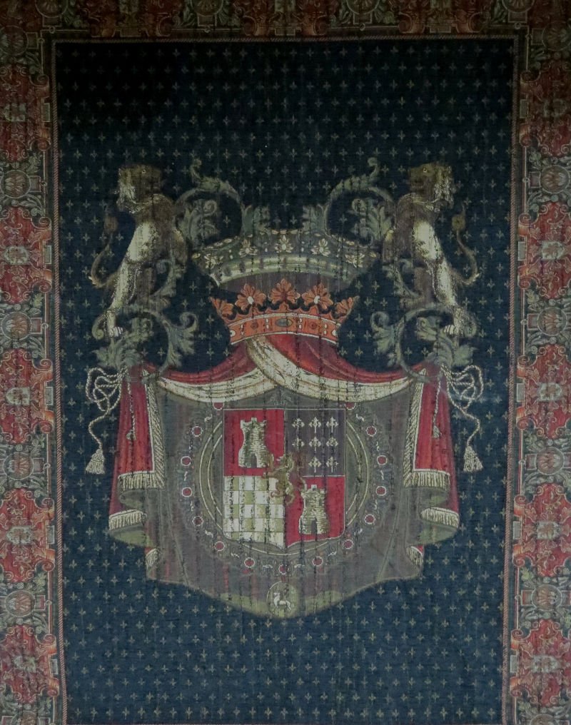 French Family Crest Tapestry: French Family Crest Tapestry, on the sides of bar has glass gilt balls. Measures - 52 1/2" wide x 72" high.