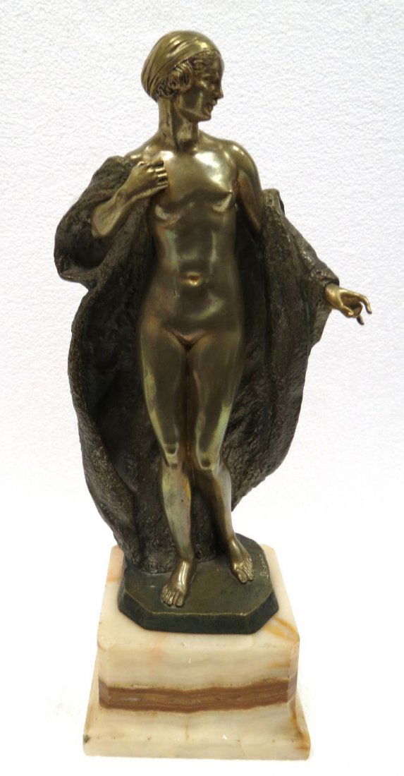 Joe Descomps (French 1869-1952) Bronze Figure: Joe Descomps (French 1869-1952) Bronze Figure. Depicting a nude art deco maiden with an open dropped coat. Signed Joe Descomps, Raised on a square onyx base. Measures - 17 1/4" high.