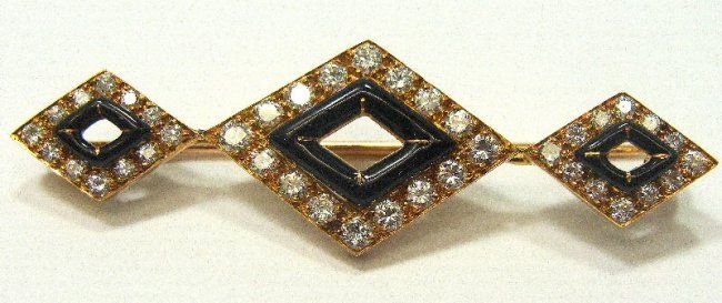 Vintage David Webb 18 kt YG Diamond Onyx Pin: David Webb 18 kt YG David Webb 18 kt YG Pin/Brooch. Gorgeous vintage David Webb 18 kt yellow gold pin/brooch with approx 3/4 ct brilliant diamonds and onyx accents in a fabulous geometric design. Meas