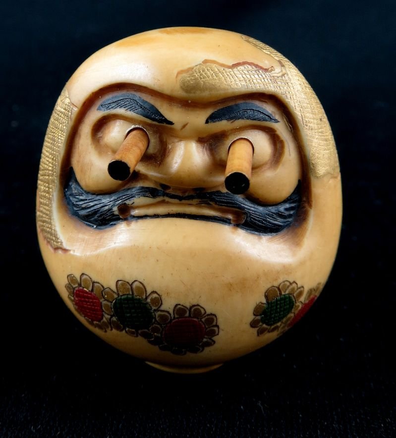 Chinese Polychrome Hand Carved Ivory Netsuke: Chinese Polychrome Hand Carved Ivory Netsuke, depicting man with eyes popping out. Measures - 1 1/2" high.