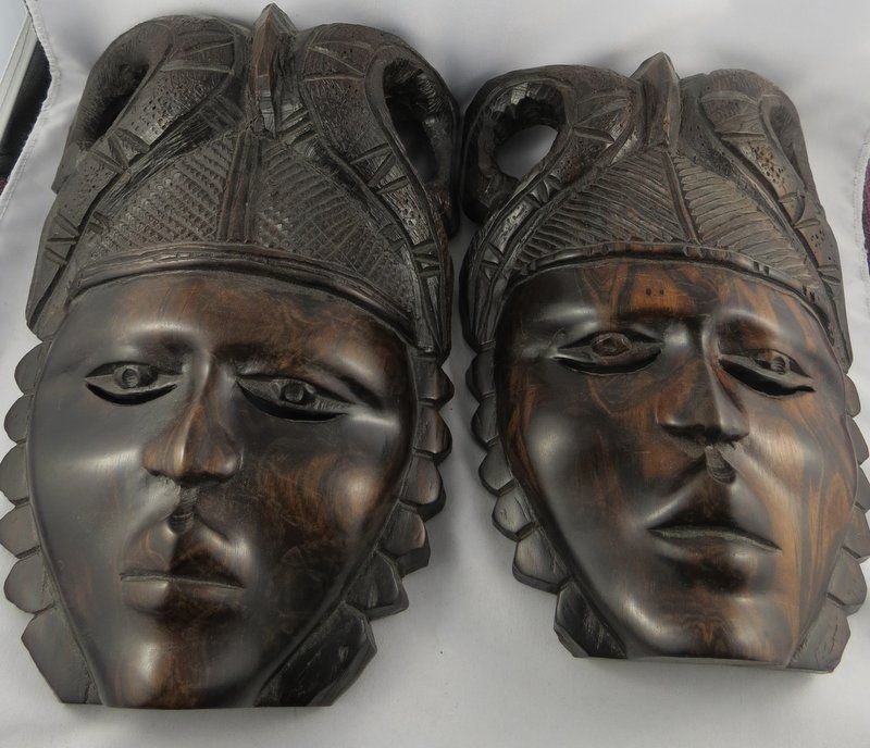 Pair of African Wooden Masks Wall Plaques: Pair of African Wooden Masks Wall Plaques. Measures - 10 1/2" high.