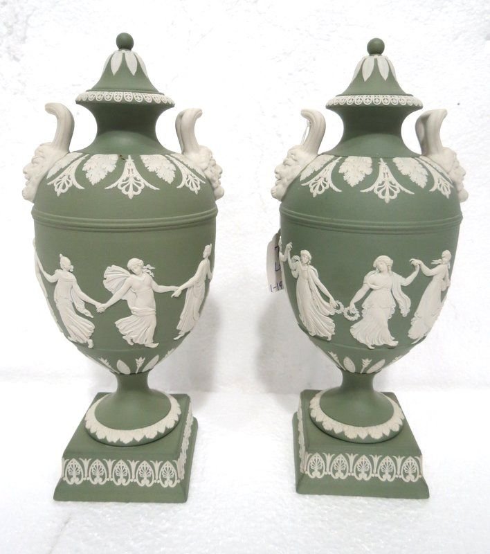 Pair of Wedgwood Jasperware Urns: Pair of Wedgwood Jasperware Urns, with dancing maidens, marked Wedgwood. Measures - 10" high x 4" wide.