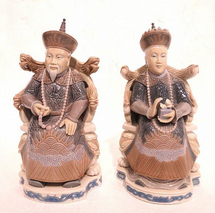Lladro Porcelain Chinese Nobleman & Noblewoman: Lladro Porcelain Chinese Nobleman & Noblewoman. Pair of Lladro Spanish porcelain figures depicting a Chinese Emperor and Empress seated on thrones, each titled "Chinese Nobleman #4921 and Chinese Nobl
