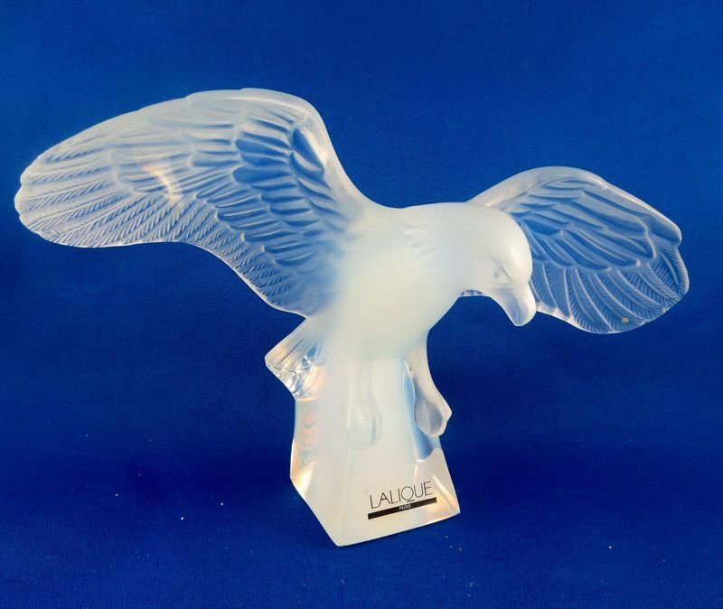 Lalique Crystal Opaline Eagle Figurine: Lalique Crystal Opaline Eagle Figurine with outspread wings. Style No. 1219300, retail price - $935.00. Measures - 5 1/3" high x 9" wide.