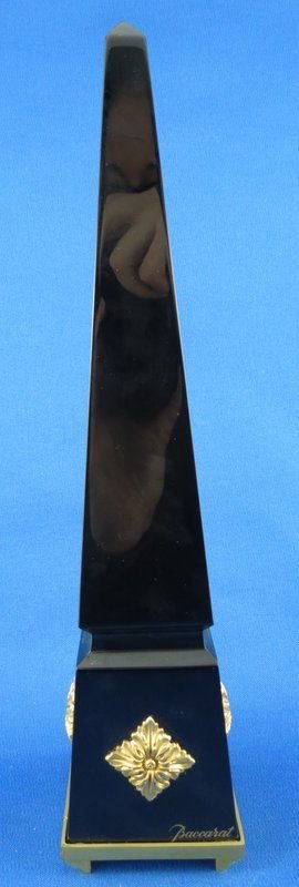 Baccarat Crystal Noir Black Obelisk: Rare Baccarat Crystal Noir Black Obelisk with bronze accents & fitted four footed stand. Measures - 10 1/4" high.