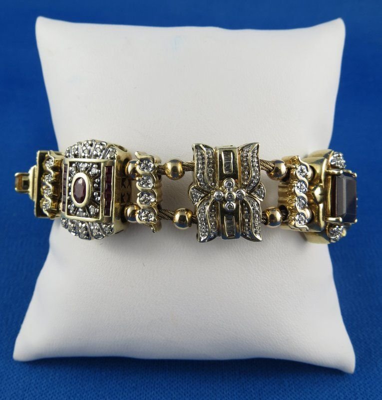 10Kt YG Diamond & Gemstone Slide Bracelet: 10Kt YG Diamond & Gemstone Slide Bracelet. The bracelet features a sectional double row design that is pave set with 98 round brilliant and baguette cut diamonds that weigh approx. 1.00ct. They are ce