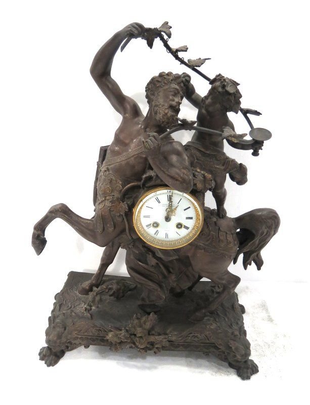 Large Gilt Metal Sentaur Figural Clock: Large Gilt Metal Sentaur Figural Clock, lion footed w/ key pendulum. Measures - 21 1/2" high x 16 1/2" wide x 7" deep.