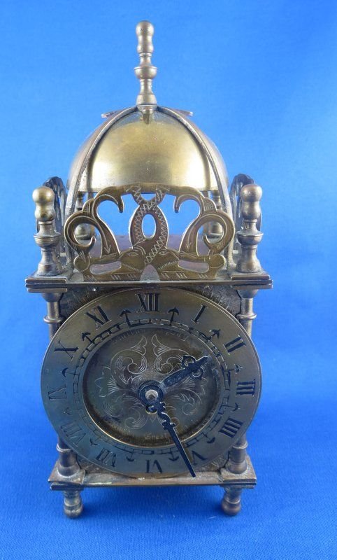 Great Britain Smith 8 Day Lantern Clock: Great Britain Smith 8 Day Lantern Clock, Roman Numeral face. Measures - 7 1/2" high x 3 1/2" wide.