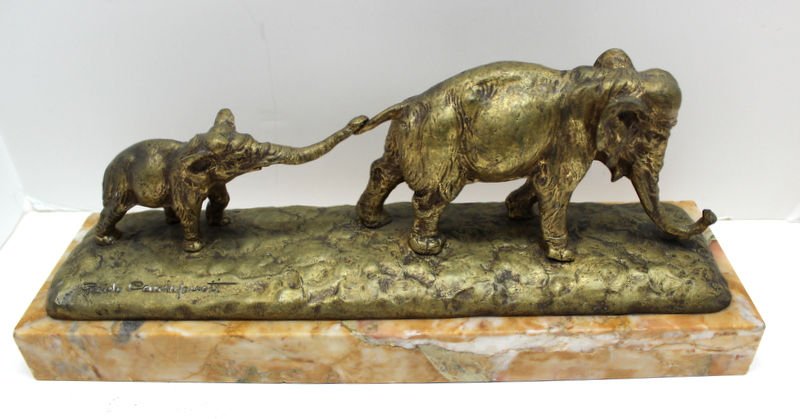 Guido Cacciapuoti (Italian 1892 - 1953) Bronze Elephant: Guido Cacciapuoti (Italian 1892 - 1953) Bronze Elephant Group. Measures - 6 1/2" high x 16 1/2" long x 4 3/4" wide, one sold for $2,638. May 30th, 2011.