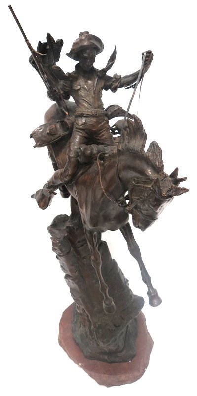 Large Carl Kauba (1865-1922) Austria Bronze Sculpture: Large Carl Kauba (1865-1922) Austria Bronze Sculpture on marble base featuring a cowboy with rifle on a horse. Measures - 28 1/2" high x 15" wide. Signed C. Kauba.