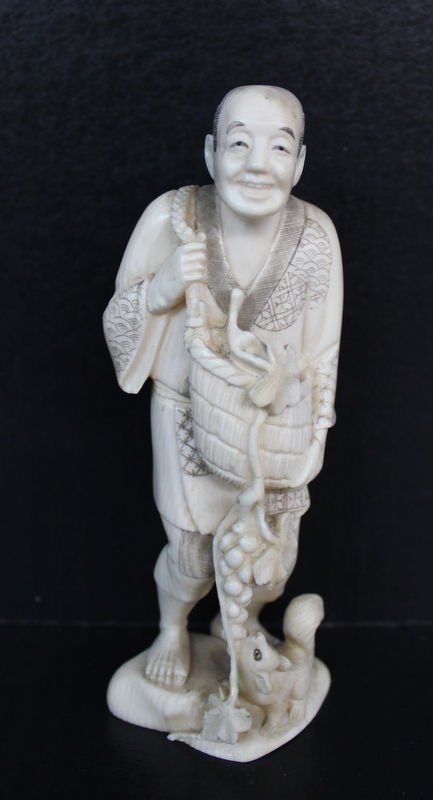 Japanese Hand Carved Ivory Figure of Man: Japanese Hand Carved Ivory Figure of Man. Measures - 4 3/4" high. Condition - slight crack in head due to age.