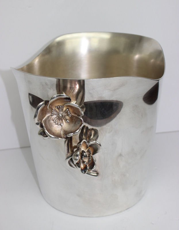 Christofle Anemone Ice Bucket: Christofle Anemone Ice Bucket, list price - $1,300. Measures - 9 1/4" high x 11 1/2" wide.