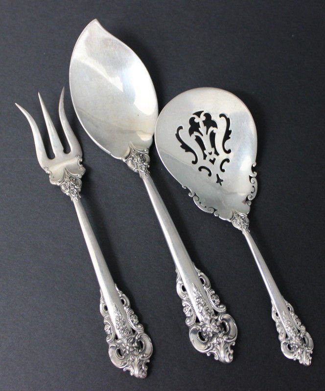 3 Pc. Wallace Grand Baroque Serving Pieces: 3 Pc. Wallace Grand Baroque Serving Pieces. Sugar spoon - 5 1/2" long, cheese server - 7" long, shrimp fork - 6" long. Weighs - 4 troy oz.