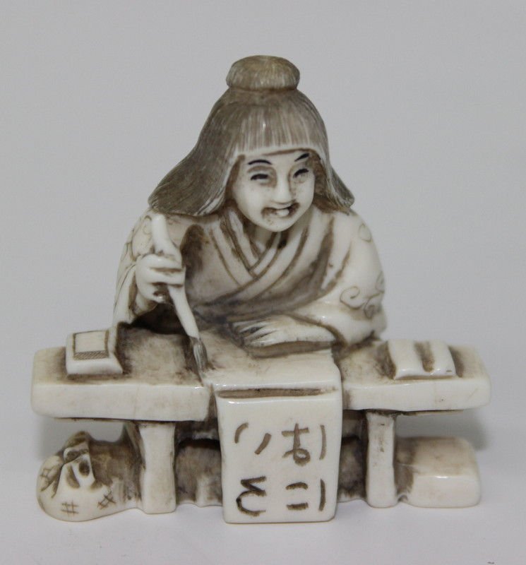 Japanese Hand Carved Ivory Netsuke: Japanese Hand Carved Ivory Netsuke. Measures - 2" high.