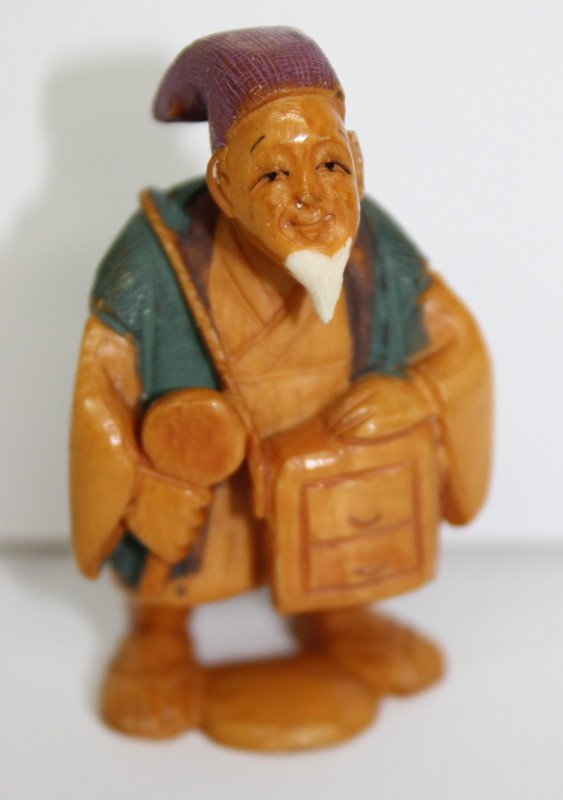 Japanese Finely Carved Ivory Netsuke: Japanese Finely Carved Ivory Netsuke. Weighs - 22.1 grams. Measures - 2 1/4" high.