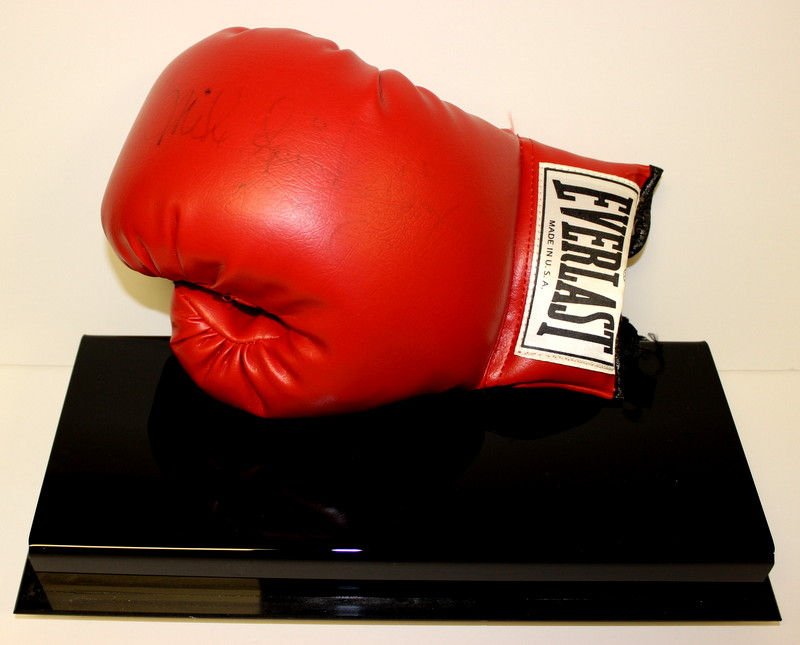 Signed Mike Spinks Everlast Boxing Glove: Signed Mike Spinks Everlast Boxing Glove framed in lucite case. Measures - 14 1/4" high x 15 7/8" long x 7" deep.